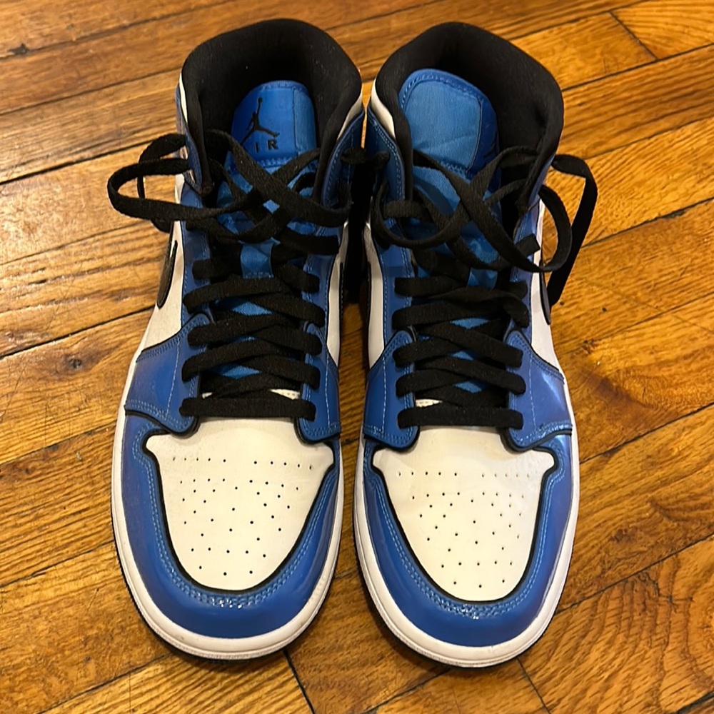 Gently used white and blue Jordan 1’s